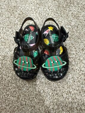 Mini Melissa Black Jelly Sandals with Green & Red Planet Charm